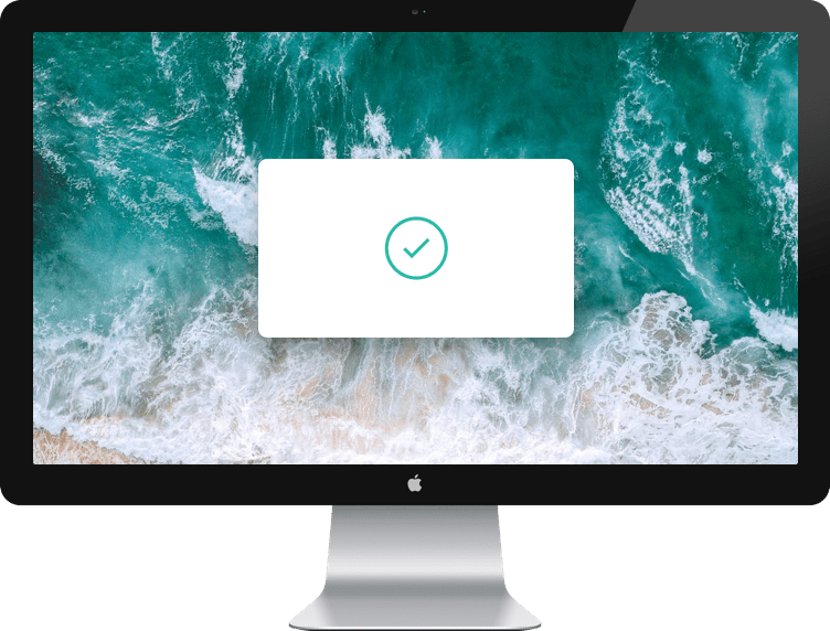 A computer monitor displaying central white box containing a green checkmark, indicating success or completion.